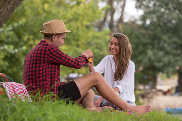 Image showing Couple in love enjoying picnic time