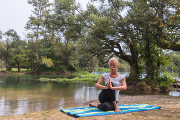 Image showing woman meditating and doing yoga exercise