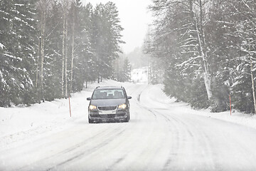 Image showing Car Driving on Winter Road