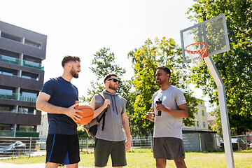 Image showing group of male friends going to play basketball