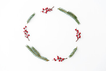 Image showing christmas frame of fir branches with red berries