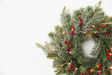 Image showing christmas fir wreath with berries and lights