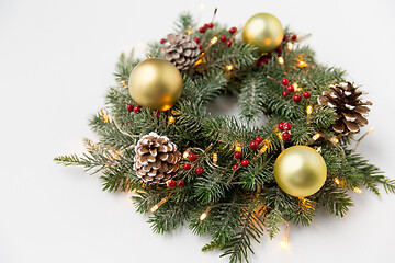 Image showing christmas fir wreath with balls, cones and lights