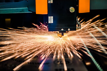 Image showing CNC Laser cutting of metal, modern industrial technology.