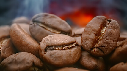 Image showing Close up of seeds of coffee. Fragrant coffee beans are roasted s