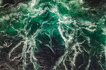 Image showing Waves of water of the river and the sea meet each