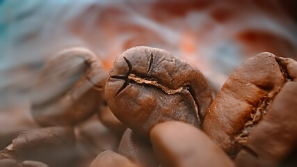 Image showing Close up of seeds of coffee. Fragrant coffee beans are roasted s