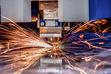 Image showing CNC Laser cutting of metal, modern industrial technology.