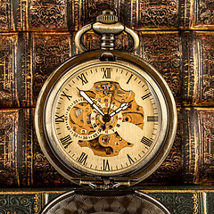 Image showing Antique clock dial close-up. Vintage pocket watch.