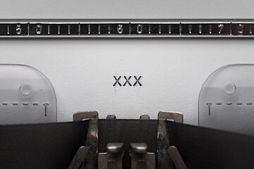 Image showing Typing text on typewriter