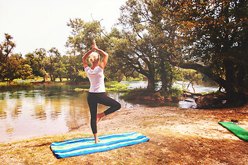 Image showing woman meditating and doing yoga exercise