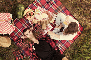 Image showing top view of couple enjoying picnic time