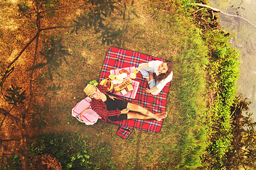 Image showing top view of couple enjoying picnic time