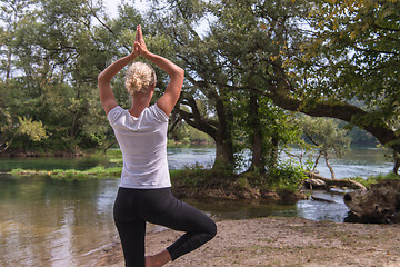 Image showing woman meditating and doing yoga exercise