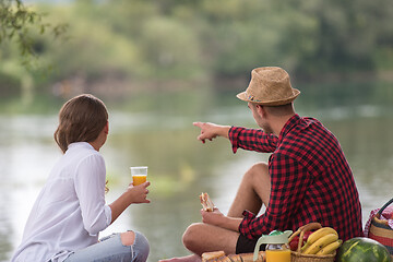 Image showing Couple in love enjoying picnic time