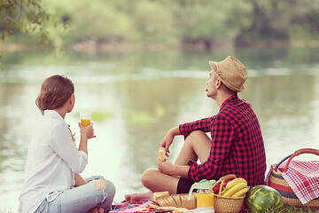 Image showing Couple in love enjoying picnic time