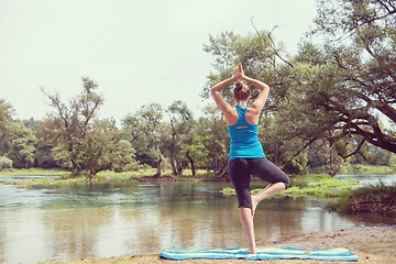 Image showing woman meditating and doing yoga exercise