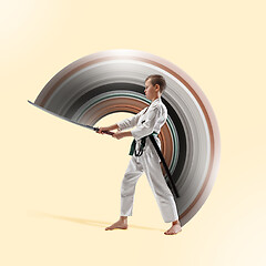 Image showing Teen boy fighting at aikido training in martial arts school