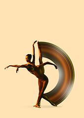 Image showing Two young female ballet dancers under water drops