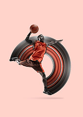 Image showing Full length portrait of a basketball player with ball