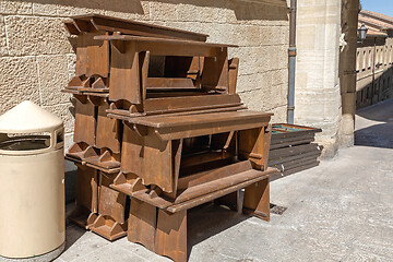 Image showing Stacked Wooden Benches