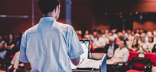 Image showing Public speaker giving talk at Business Event.