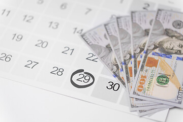 Image showing black friday sale date on calendar and money