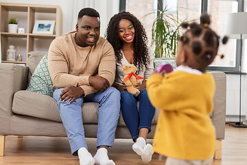 Image showing happy african family with baby daughter at home