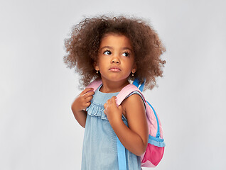 Image showing sad little african american girl with backpack