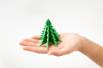 Image showing hand holding green paper origami christmas tree