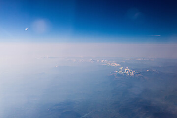 Image showing Mountain view from an airplane window.