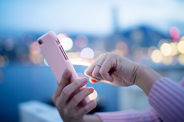 Image showing Woman use of cellphone at night