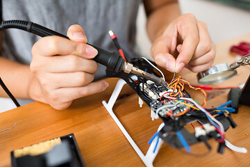 Image showing Welding on flying drone