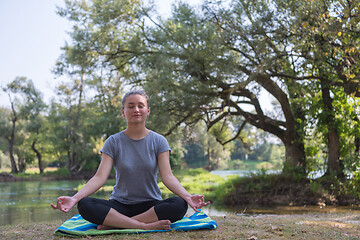 Image showing woman meditating and doing yoga exercise