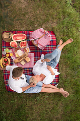 Image showing top view of couple enjoying picnic time