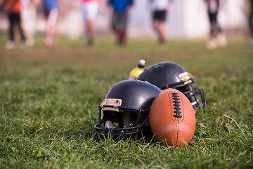 Image showing American football helmets and ball