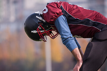 Image showing american football player resting after hard training