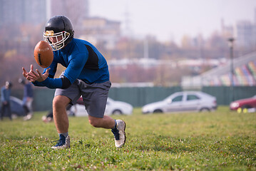 Image showing american football team in action