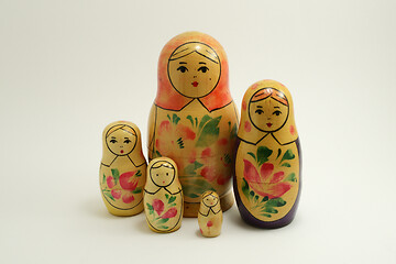Image showing five traditional Russian nesting dolls on white