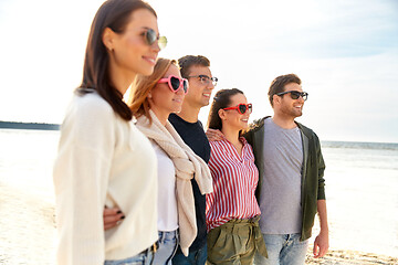 Image showing happy friends on summer beach