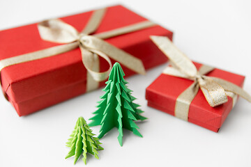 Image showing gift boxes and christmas trees on white background