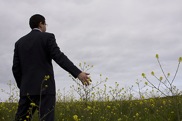 Image showing Businessman enjoying nature