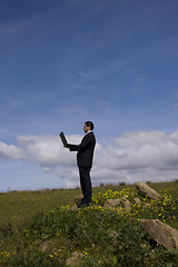 Image showing Working in the field