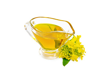 Image showing Oil mustard in gravy boat with flower