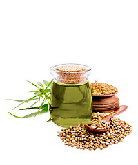 Image showing Oil hemp in jar with cereals and flour