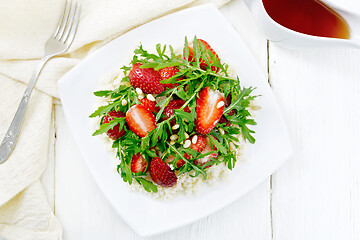 Image showing Salad of strawberry and couscous on board top