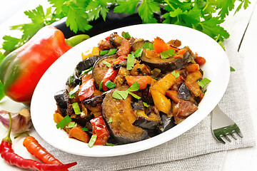 Image showing Ragout with eggplant and pepper on board