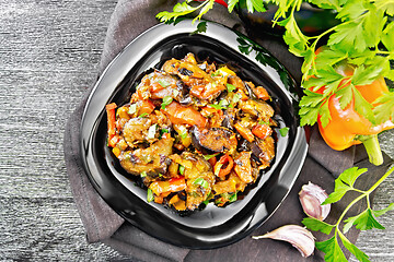 Image showing Ragout with eggplant and pepper on dark board top