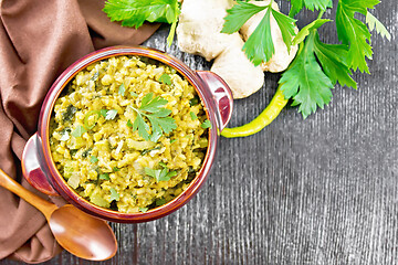 Image showing Kitchari in bowl on dark board top