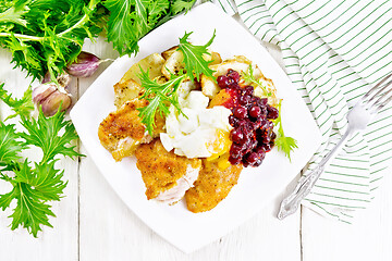 Image showing Turkey breast with cranberry sauce on board top